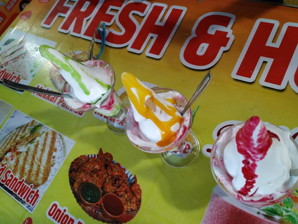 If you are at Kates Point in Mahabaleshwar, enjoy Strawberry with icecreame. They advice you it start eating from cone, without using spoon :)